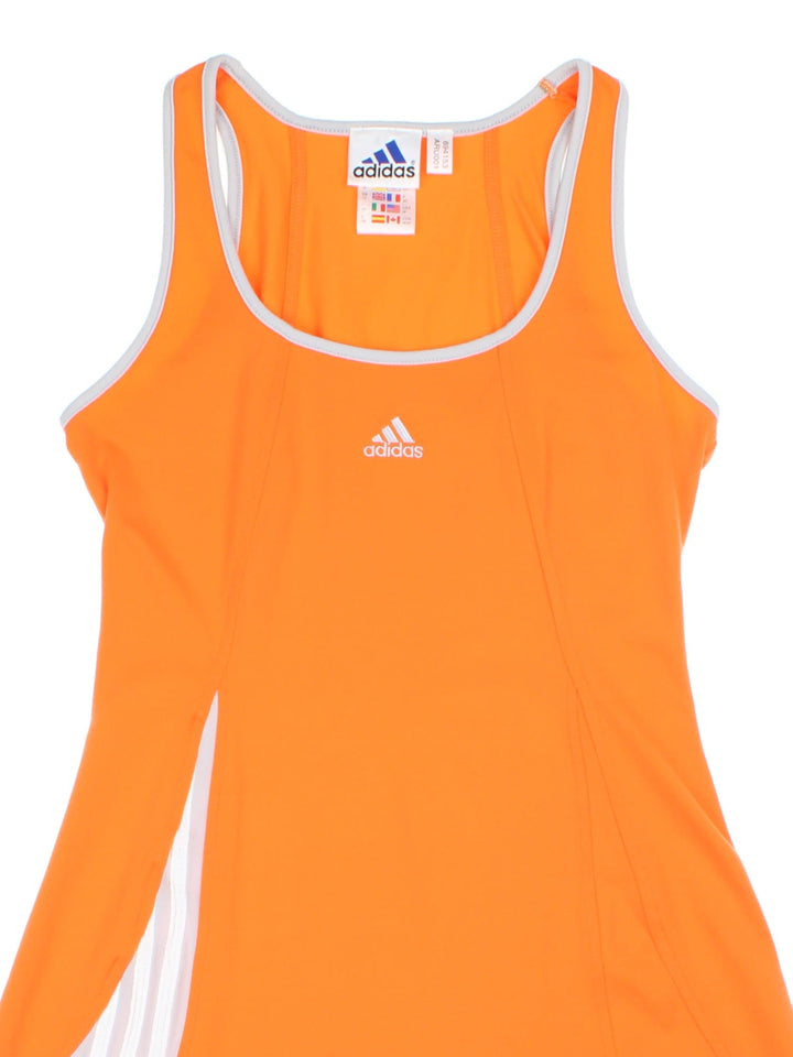 Vintage Adidas Dress in orange colourway with grey piping and logo embroidered on the front.