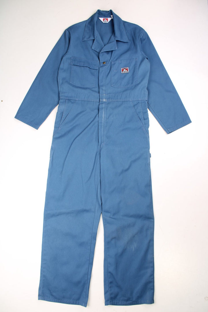 Ben Davies Boiler Suit Overalls in a blue colourway, zip up with multiple utility pockets and has the logo embroidered on the chest. 