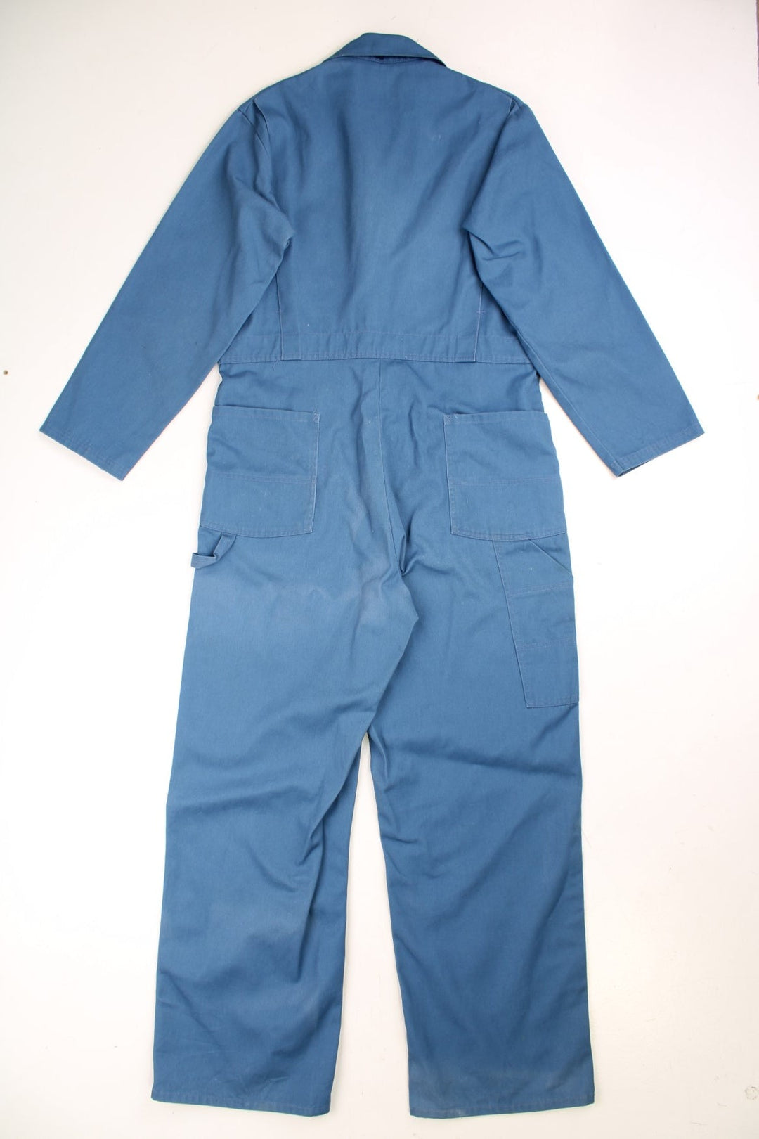 Ben Davies Boiler Suit Overalls in a blue colourway, zip up with multiple utility pockets and has the logo embroidered on the chest. 