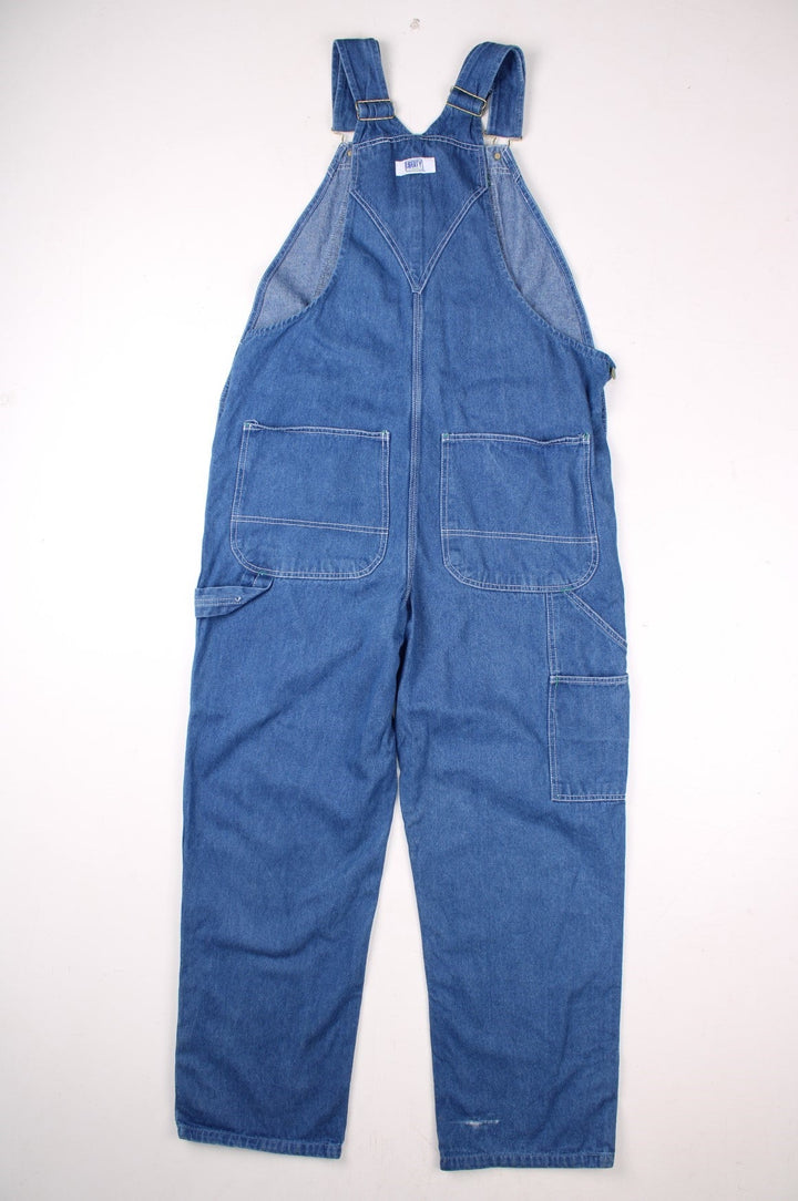 Vintage Liberty denim dungarees in blue with multiple pockets, branded hardware, and a Liberty Overalls patch on the front.