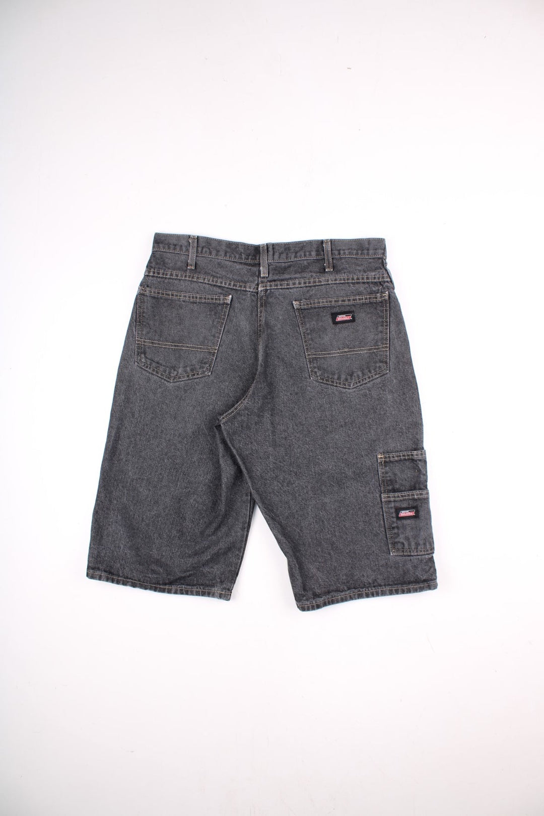 Dickies shorts in grey with multiple pockets, zip and button closure, and a small logo patch in black on the back pocket.