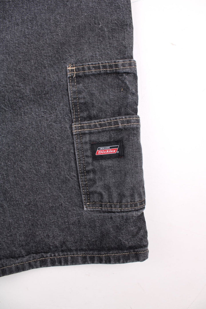 Dickies shorts in grey with multiple pockets, zip and button closure, and a small logo patch in black on the back pocket.