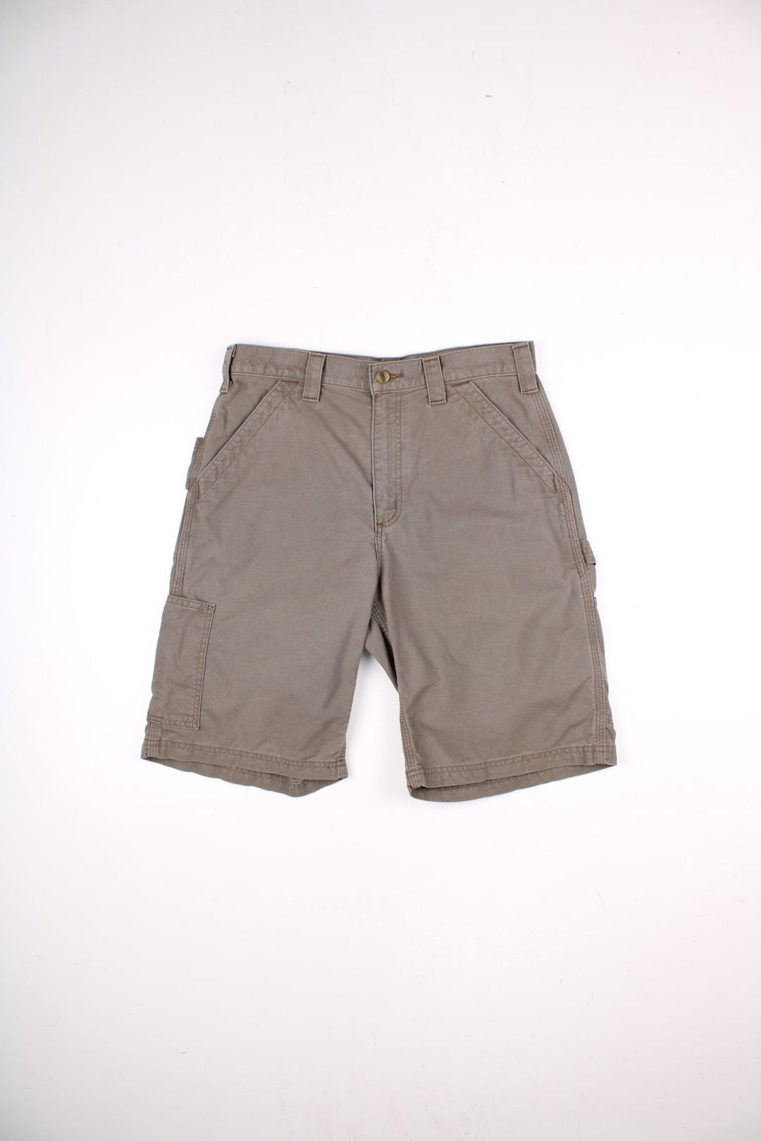 Carhartt shorts in khaki with multiple pockets, zip and button closure, and a leather logo patch on the back.