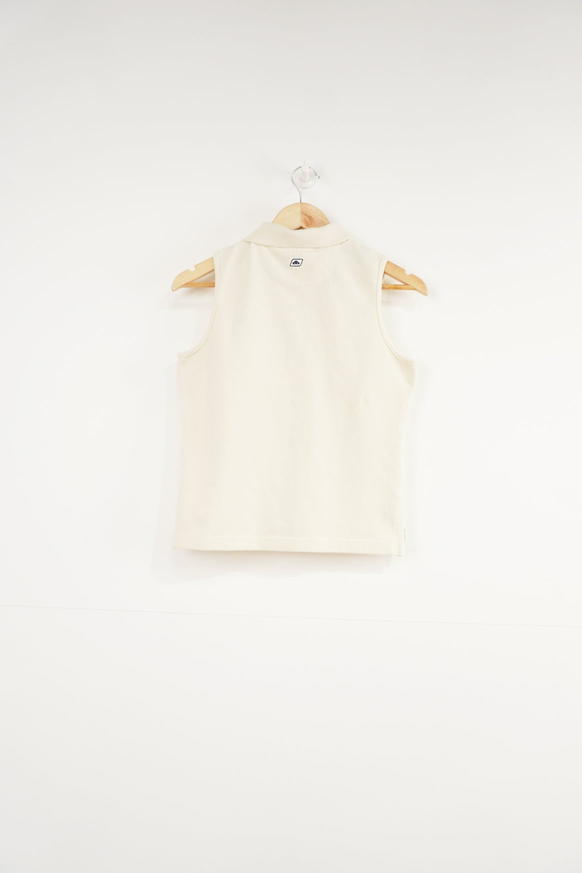 Cream Ellesse 1/4 zip vest with collar and embroidered Logo on chest