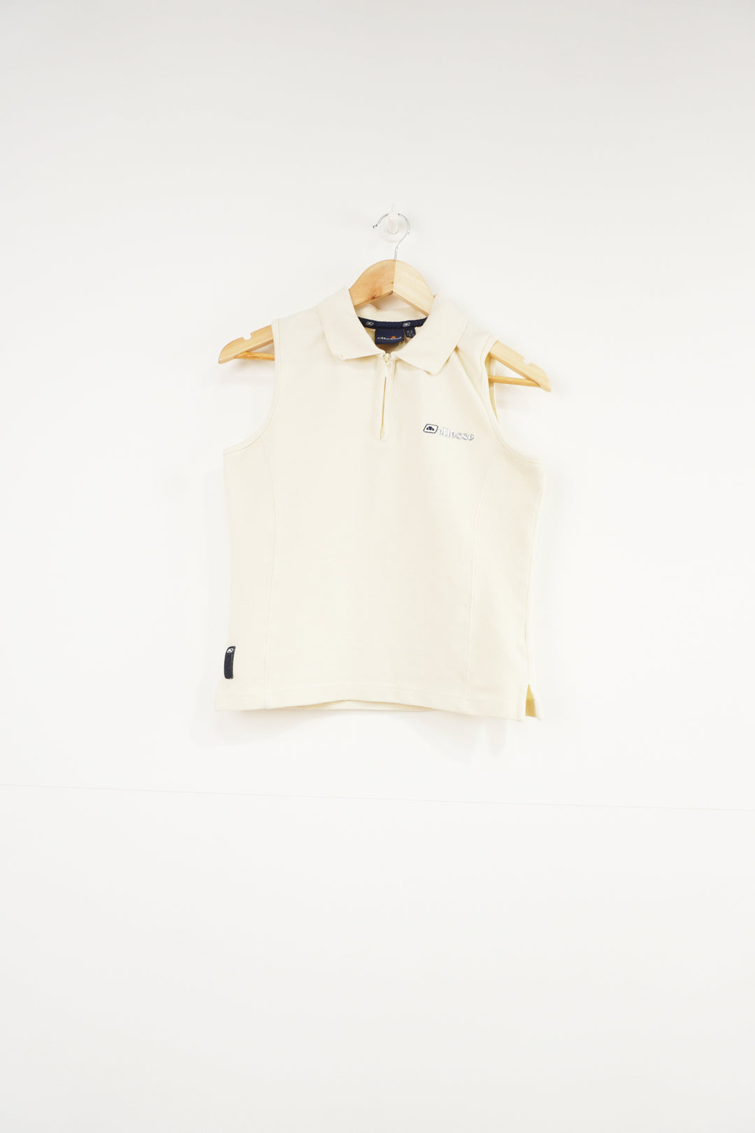 Cream Ellesse 1/4 zip vest with collar and embroidered Logo on chest