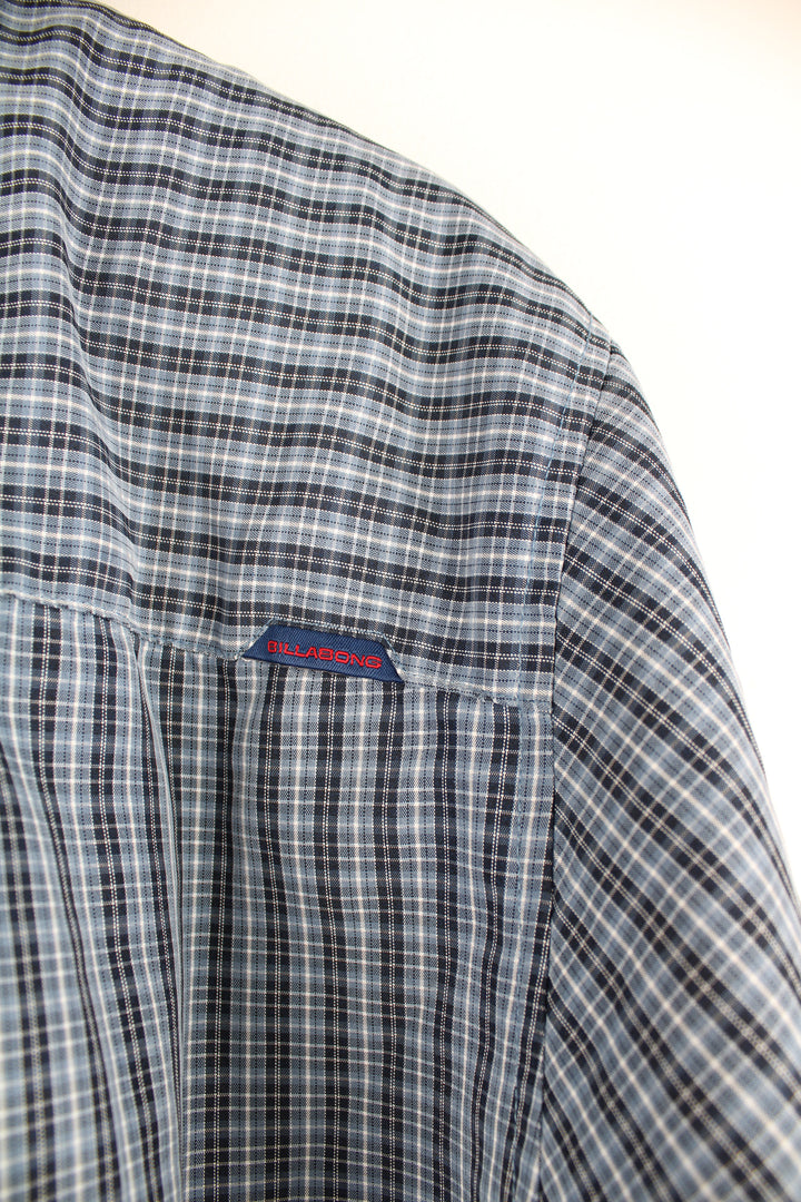 Billabong short sleeved cotton shirt in blue tone plaid, button up with chest pocket.