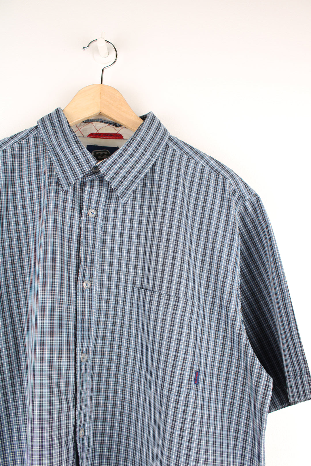 Billabong short sleeved cotton shirt in blue tone plaid, button up with chest pocket.