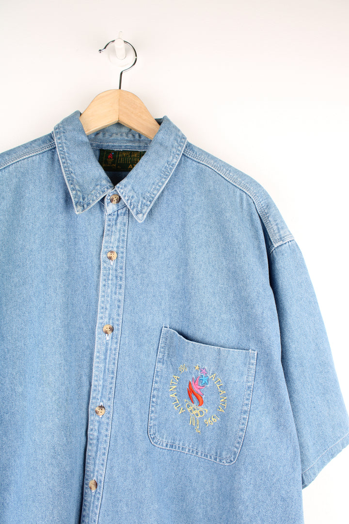 Vintage 1996 Atlanta Olympics denim button up shirt with embroidered graphic on the front pocket 