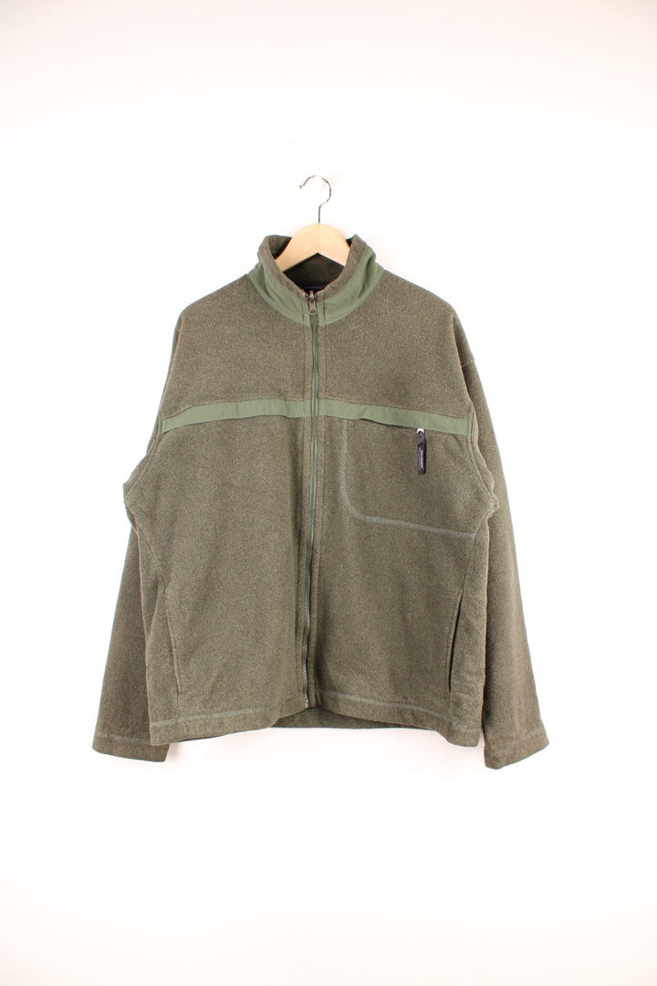 Dark green Patagonia Synchilla zip-up fleece with one zipped pocket with a branded zip-pull.   