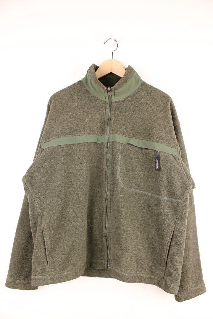 Dark green Patagonia Synchilla zip-up fleece with one zipped pocket with a branded zip-pull.   