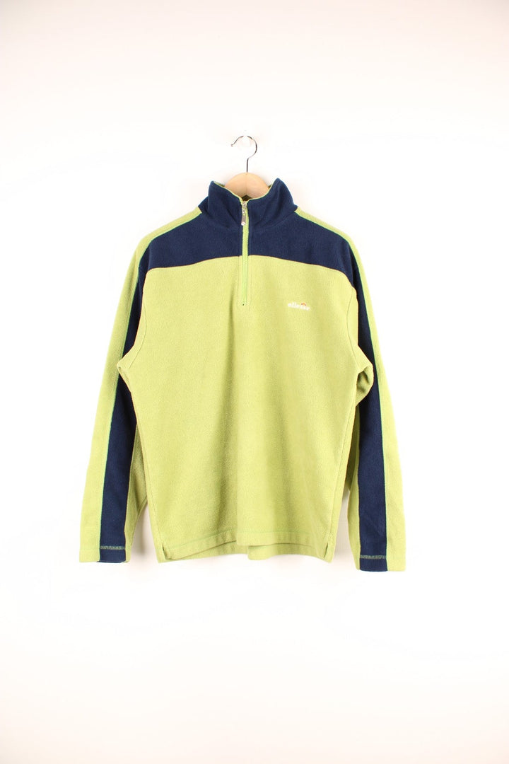 Lime green Ellesse fleece with dark blue accents, 1/4 zip closure and an embroidered logo. 