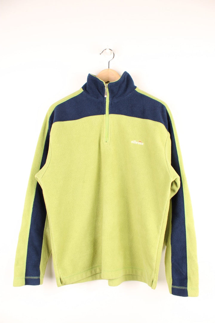 Lime green Ellesse fleece with dark blue accents, 1/4 zip closure and an embroidered logo. 