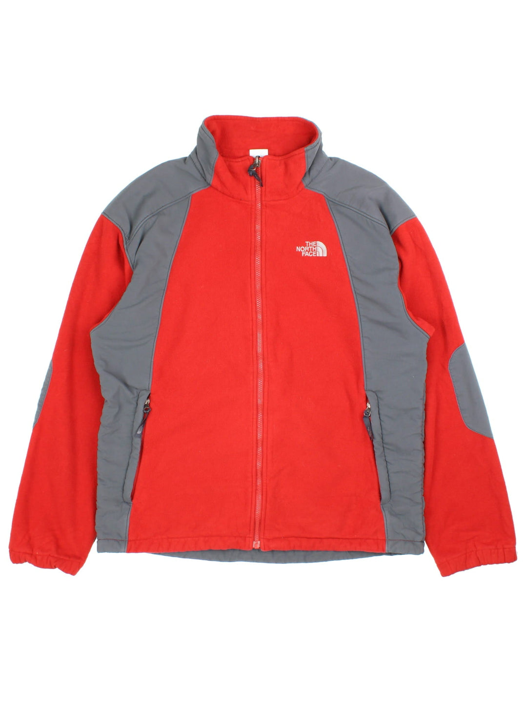 The North Face Fleece in a red colourway with grey panelling down the sides and shoulders, Full zip with multiple pockets and classic small logo on the front.