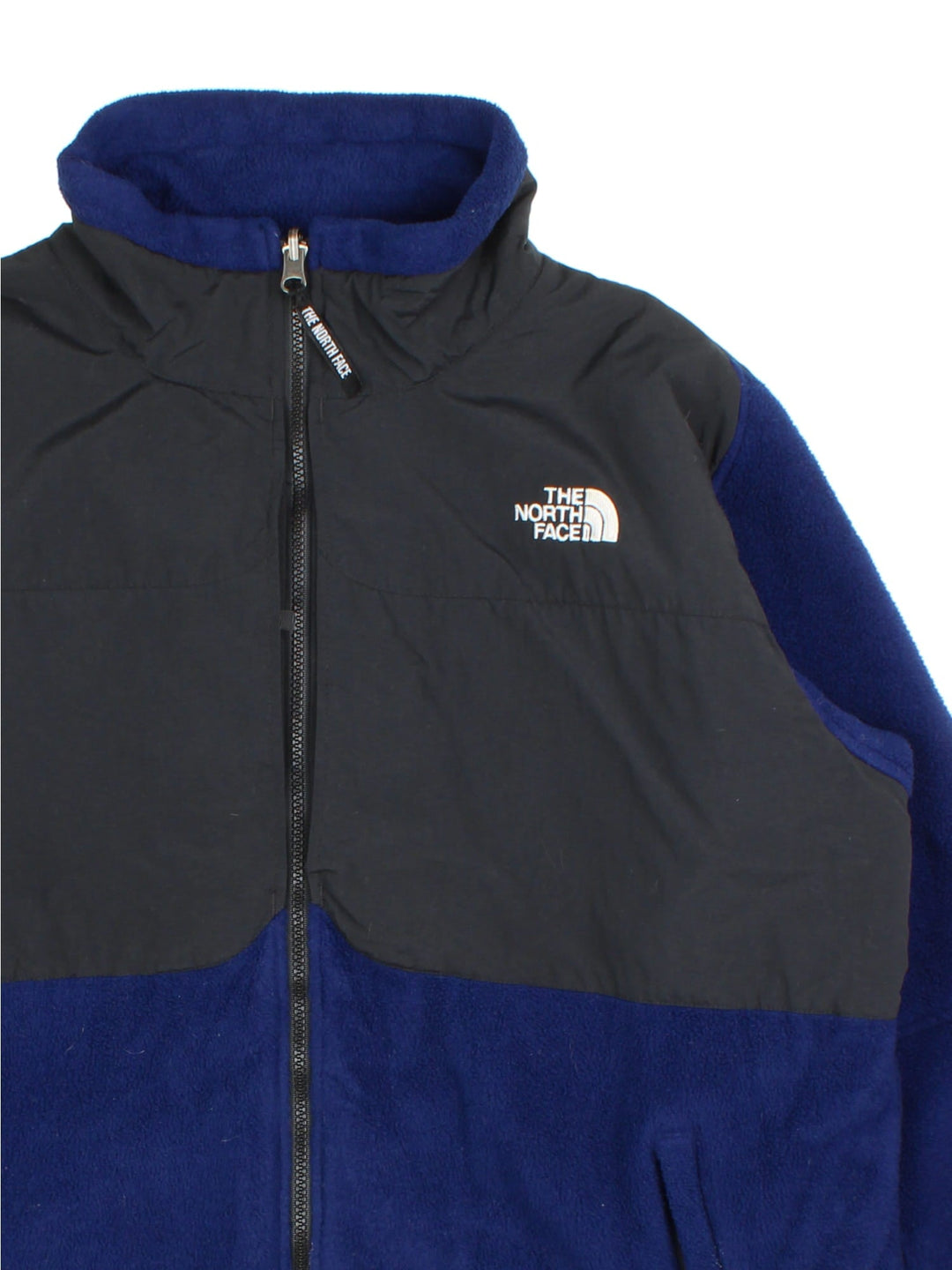 The North Face Denali Fleece in a blue & black colourway. Full zip with multiple pockets on the sides and under arms. Drawstring hem, elbow patches and classic small logo on the front and back.