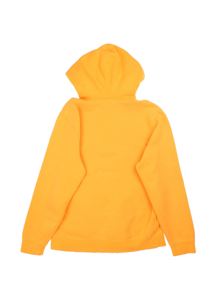 Stussy Hoodie in a yellow colourway with box logo on the front and standard double pocket.