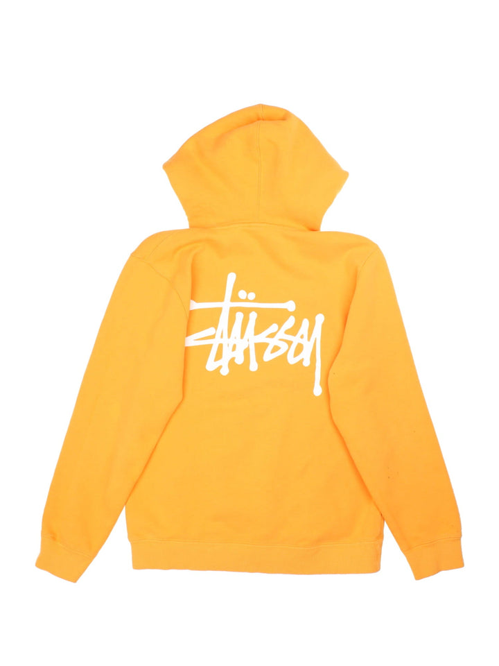 Stussy Hoodie in a yellow colourway with classic small logo on the front and large logo graphic on the back.