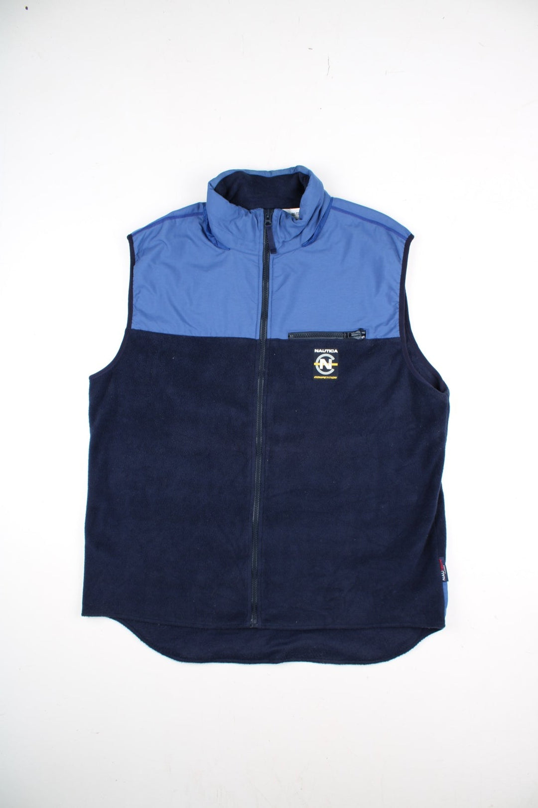 Nautica Competition Fleece Vest in a blue colourway. Zips up and a front chest pocket, hidden hood, and has the logo embroidered on the front and back.