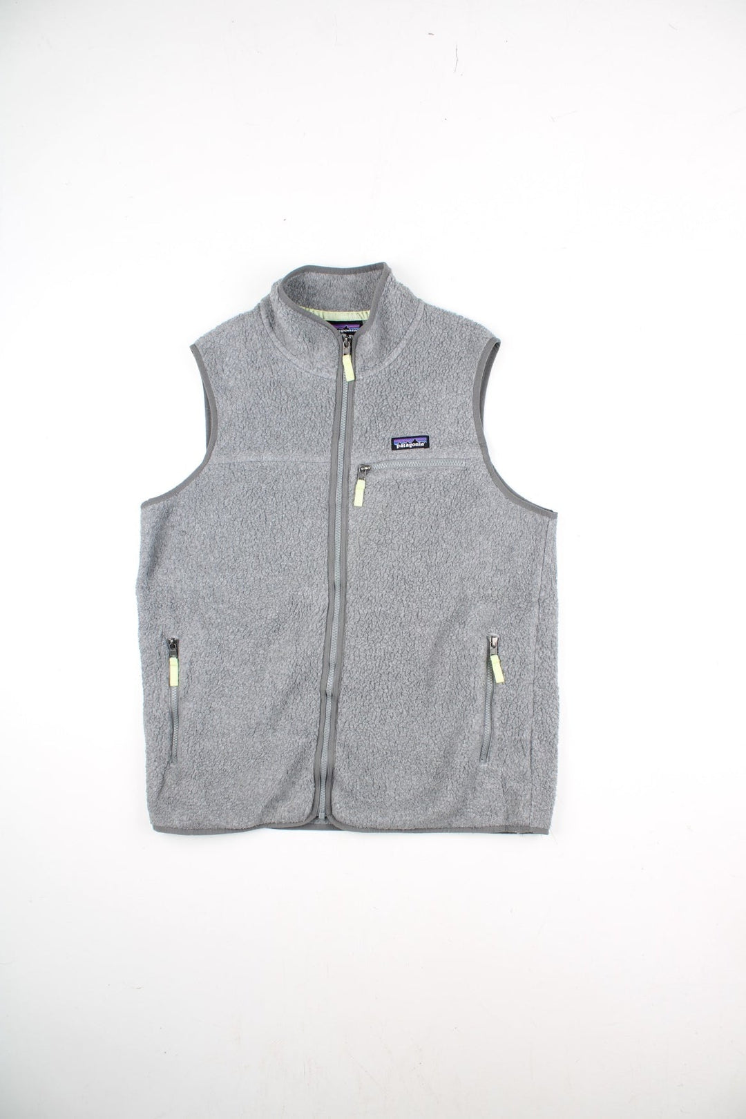 Patagonia Fleece Vest in a grey colourway. Zips up and has multiple pockets, and the logo embroidered on the front.