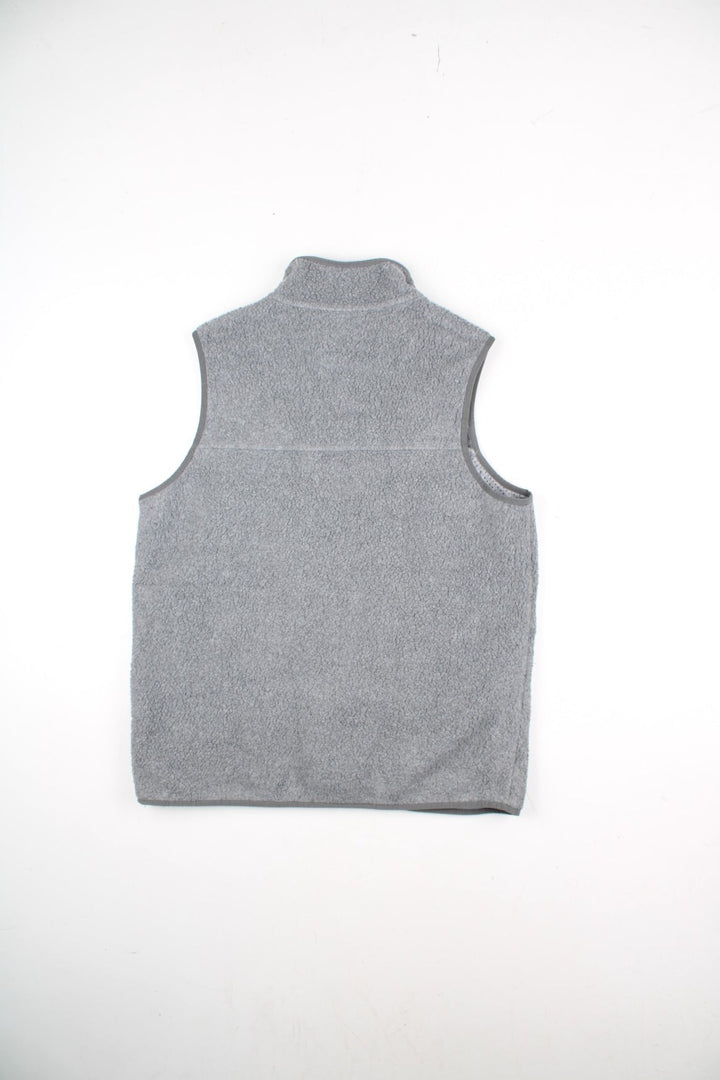 Patagonia Fleece Vest in a grey colourway. Zips up and has multiple pockets, and the logo embroidered on the front.