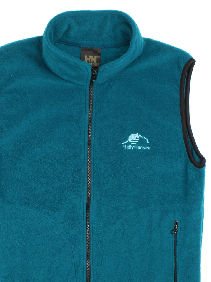 Helly Hansen Fleece Gilet in a blue colourway. Full zip, zip pockets and small logo embroidered on the front.