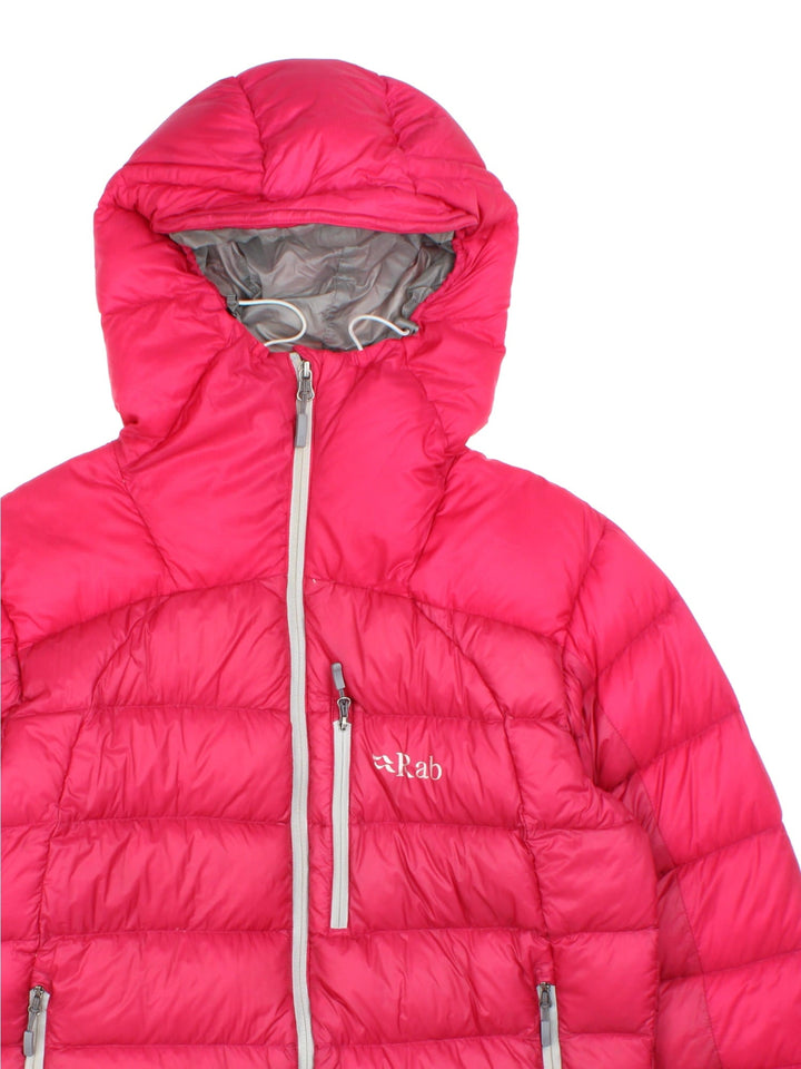 Rab Puffer Coat in a pink colourway. Full zip, multiple zip pockets on front and drawstring hood. Small logo on front.