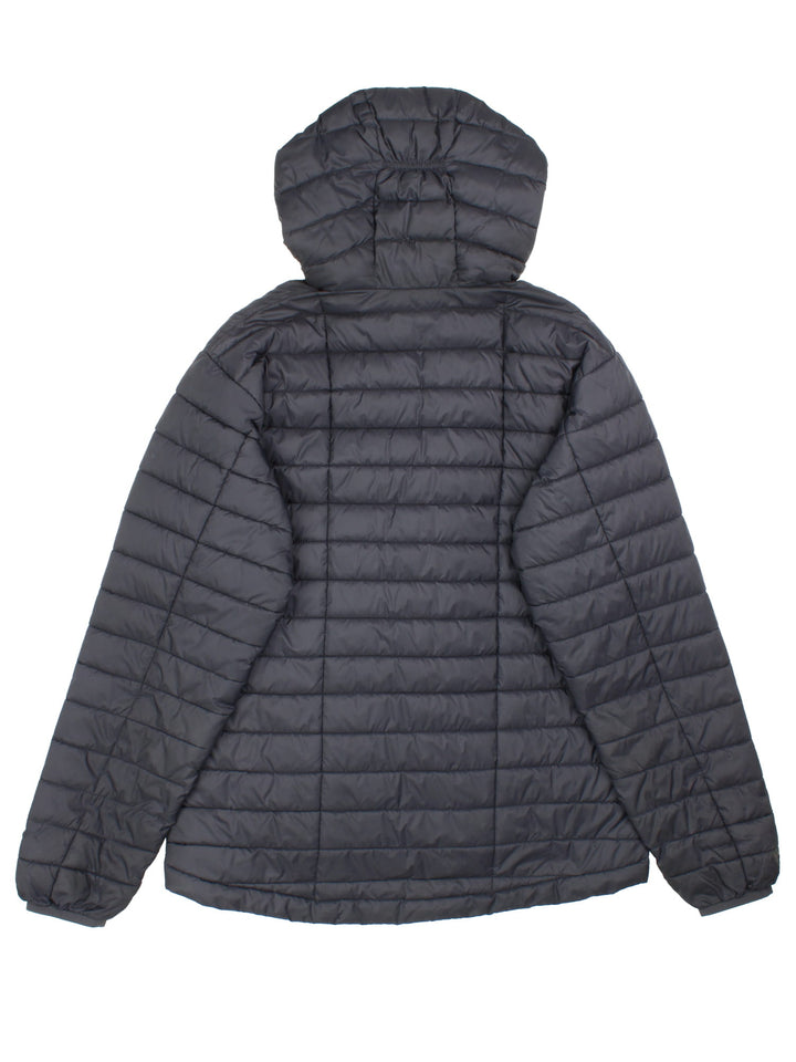 Rab Nebula Puffer Coat in a black colourway. Full red zip detail and multiple pockets on front with a drawstring hood.