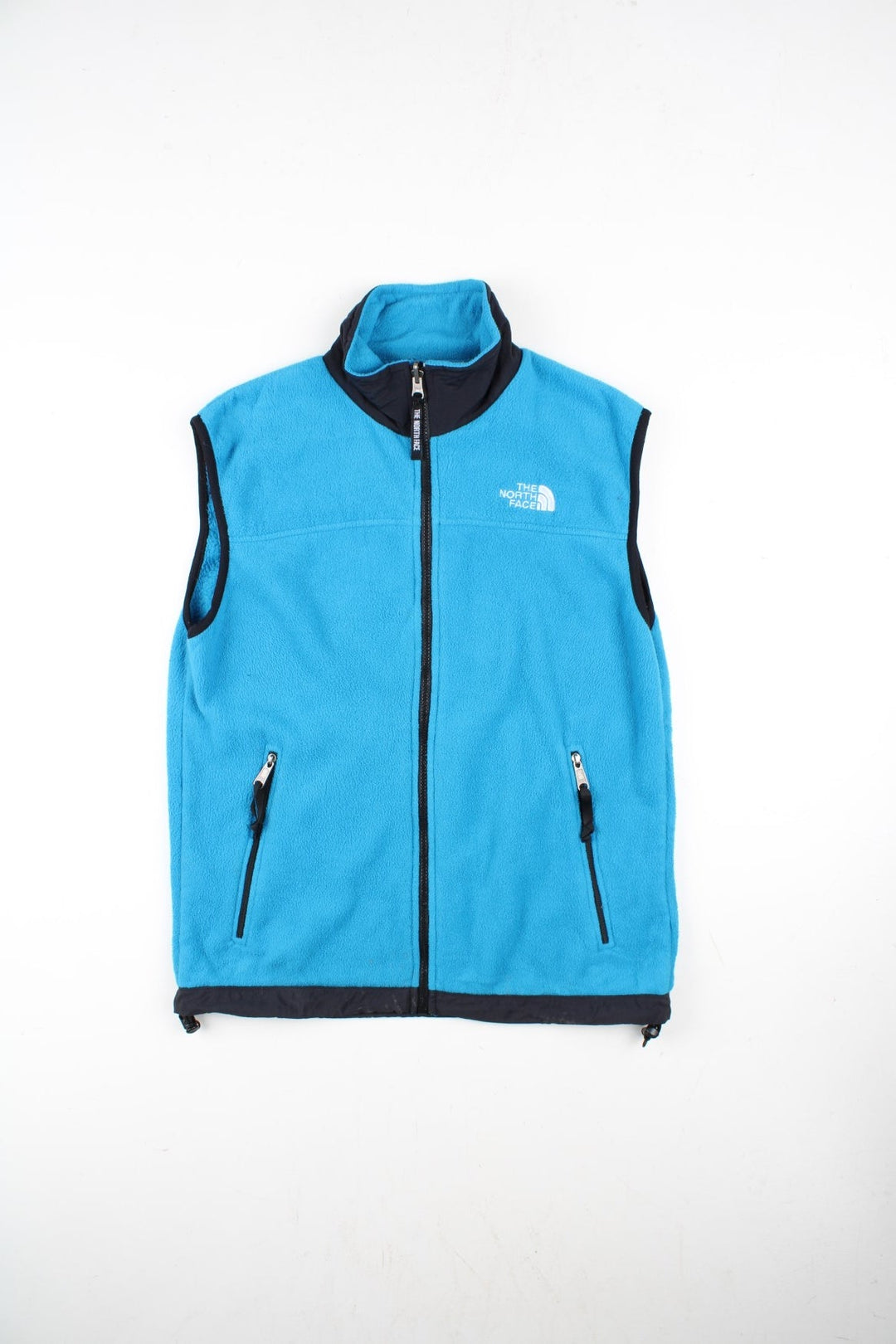 Vintage The North Face Gilet in a blue/black colourway. Zip up with side zip pockets, logo embroidered on front.