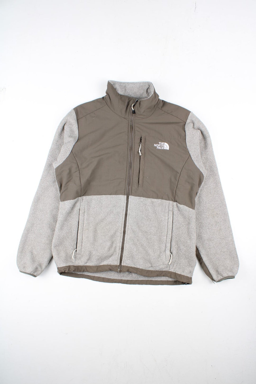 Vintage The North Face Denali Fleece in a grey and light brown colourway. Zip up fastening with side zip pockets, and branding embroidered on the front.