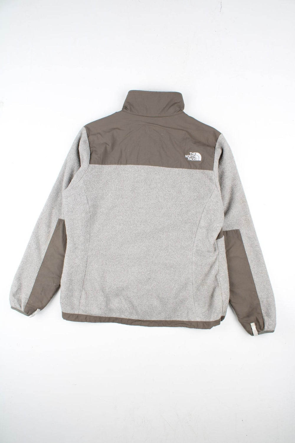 Vintage The North Face Denali Fleece in a grey and light brown colourway. Zip up fastening with side zip pockets, and branding embroidered on the front.