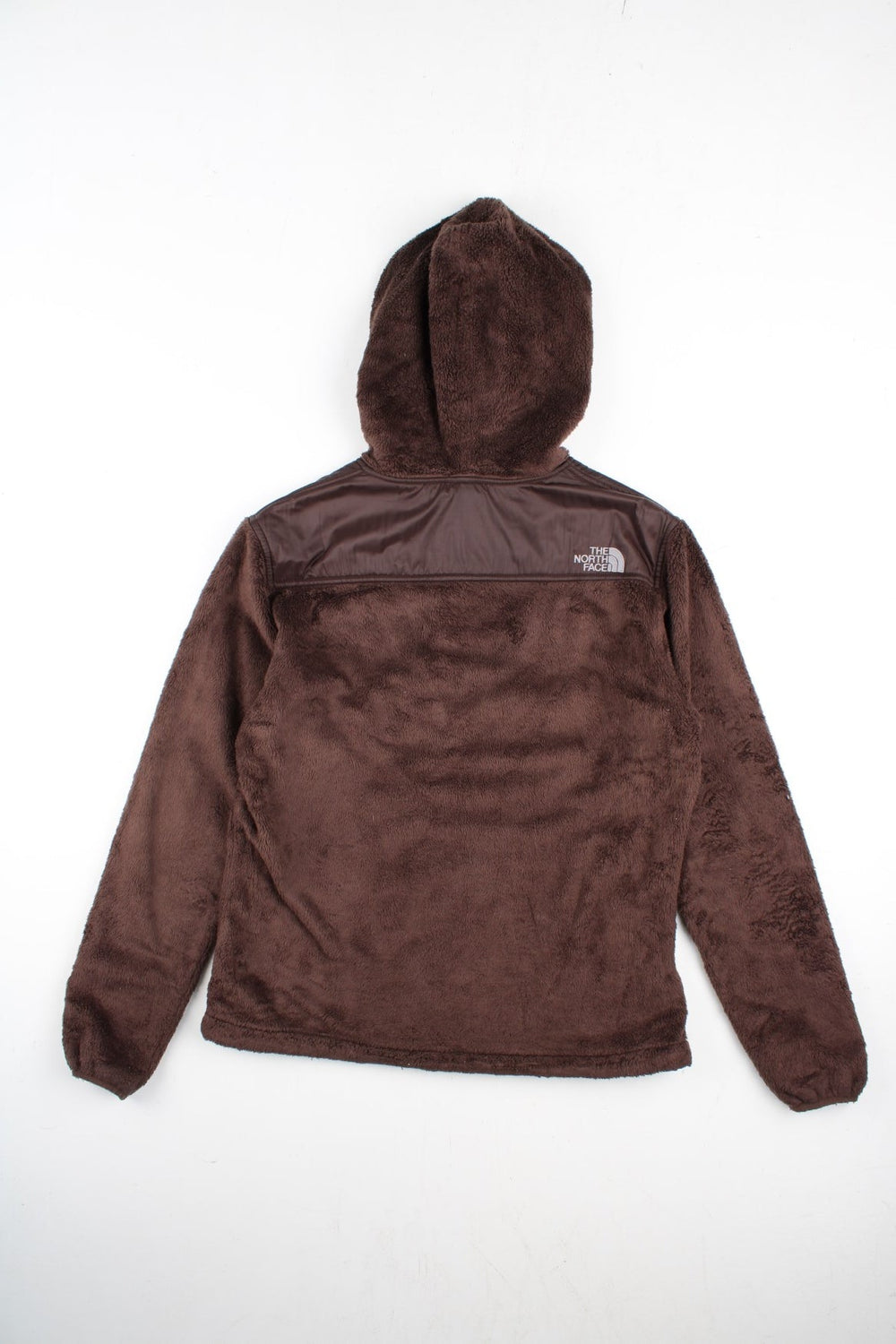 The North Face Fleece in a brown colourway. Zip up fastening with side zip pockets, hood and branding embroidered on front/back.