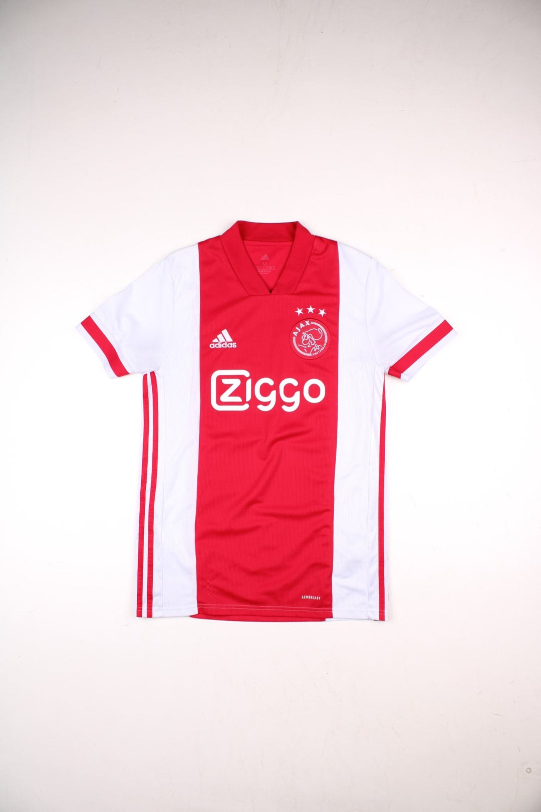 Ajax 2020/21 Adidas Football Shirt in the red and white home kit colourway, features embroidered logos and badge on the front.