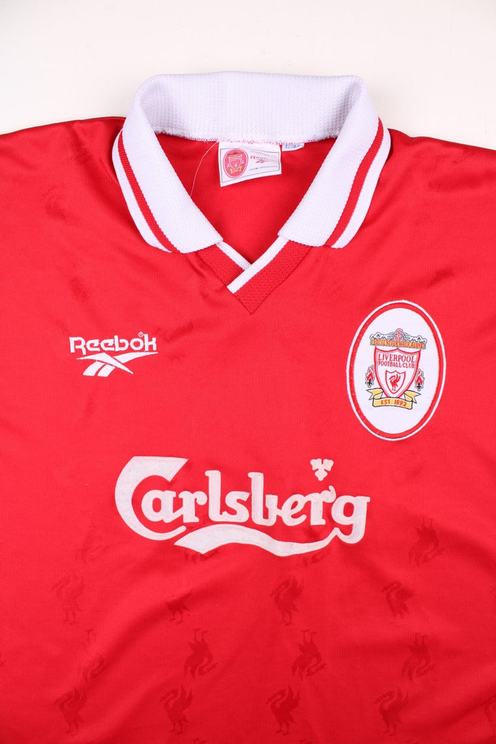 Liverpool 1996/98 Reebok Football Shirt in the red home kit colourway, features embroidered logos and badge on the front.