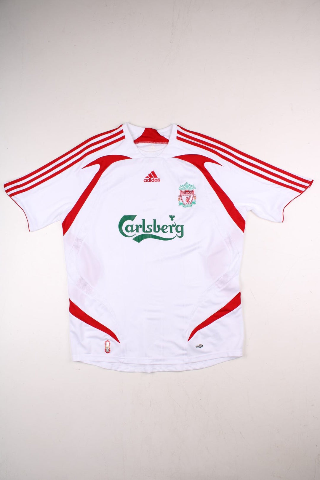 Liverpool 2007/08 Adidas Football Shirt in the white away kit colourway, features embroidered logos and badge on the front.