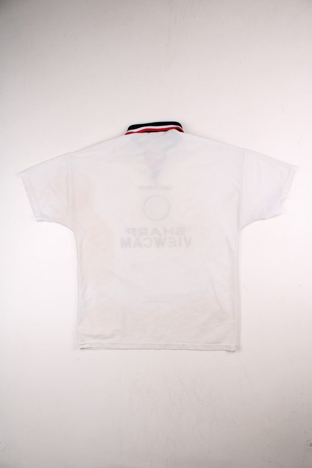 Manchester United 1996/97 Umbro Football Shirt in the white away kit colourway, features embroidered logos and badge on the front.