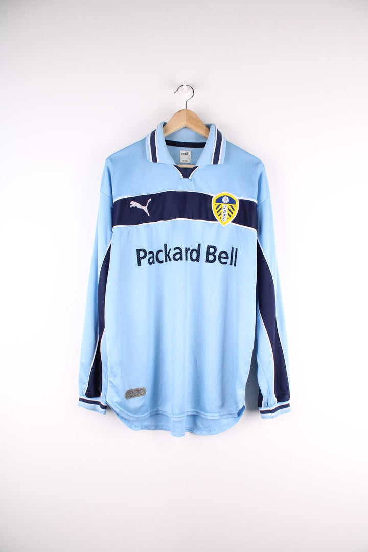 Leeds United 1999/00 Puma Long Sleeve Football Shirt in the blue away kit colourway, features embroidered logos and badge on the front.