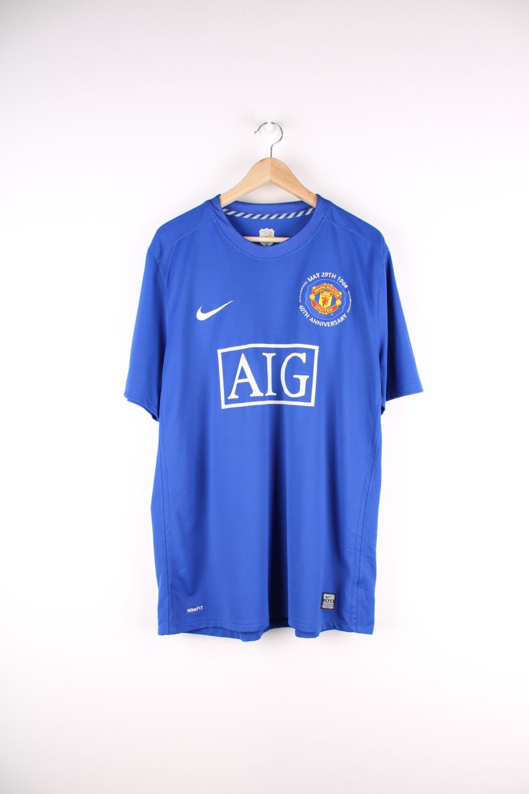 Manchester United 2008/09 Nike Football Shirt in the blue third kit colourway, features embroidered logos and badge on the front.