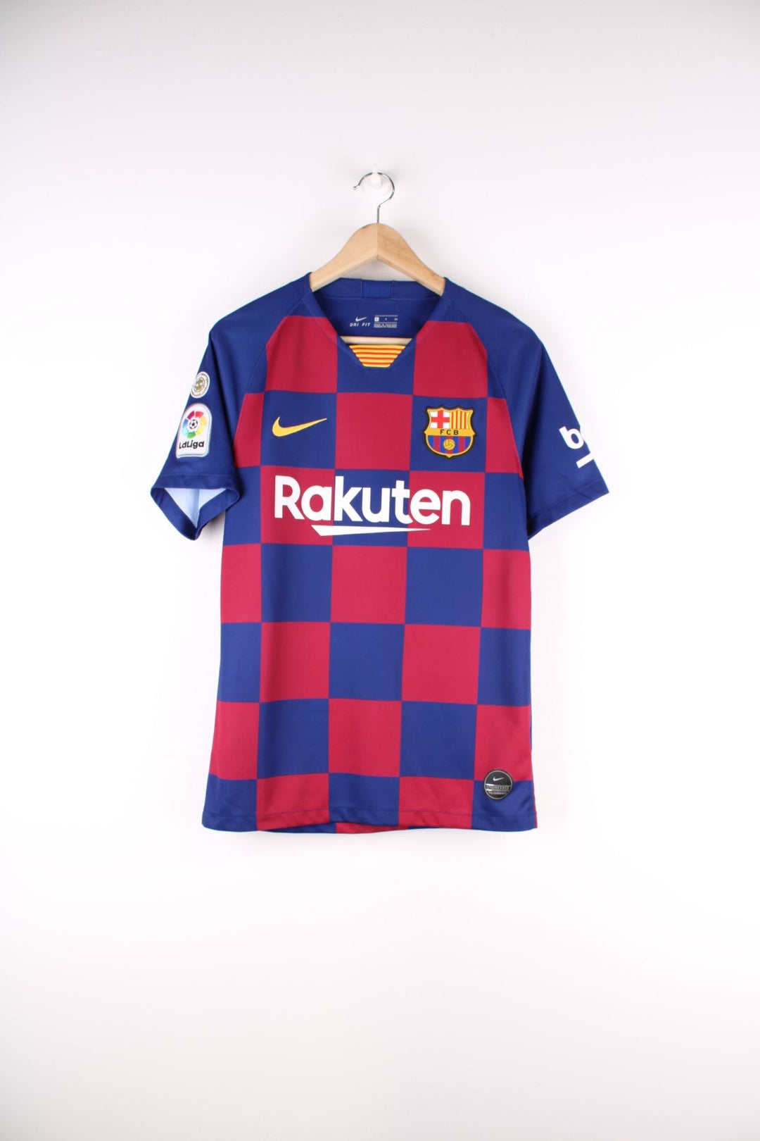 Barcelona Nike Football Shirt in the blue and red home kit colourway, features embroidered logos and badge on the front, and Messi number 10 printed on the back.