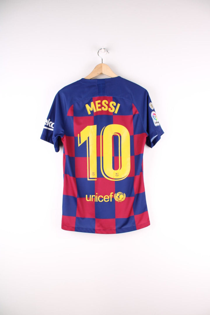 Barcelona Nike Football Shirt in the blue and red home kit colourway, features embroidered logos and badge on the front, and Messi number 10 printed on the back.