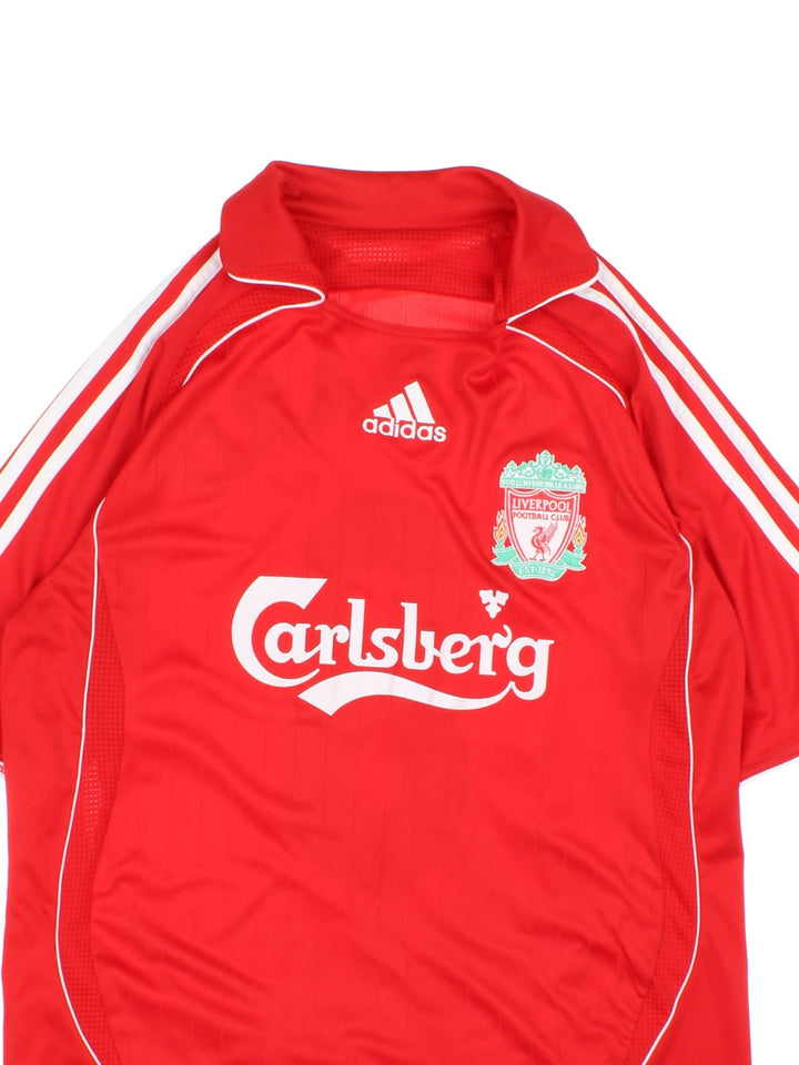 Liverpool 2006/07 Adidas Football Shirt in the red home kit colourway, features embroidered logos and badge on the front.