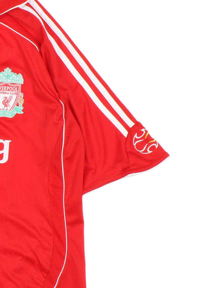 Liverpool 2006/07 Adidas Football Shirt in the red home kit colourway, features embroidered logos and badge on the front.