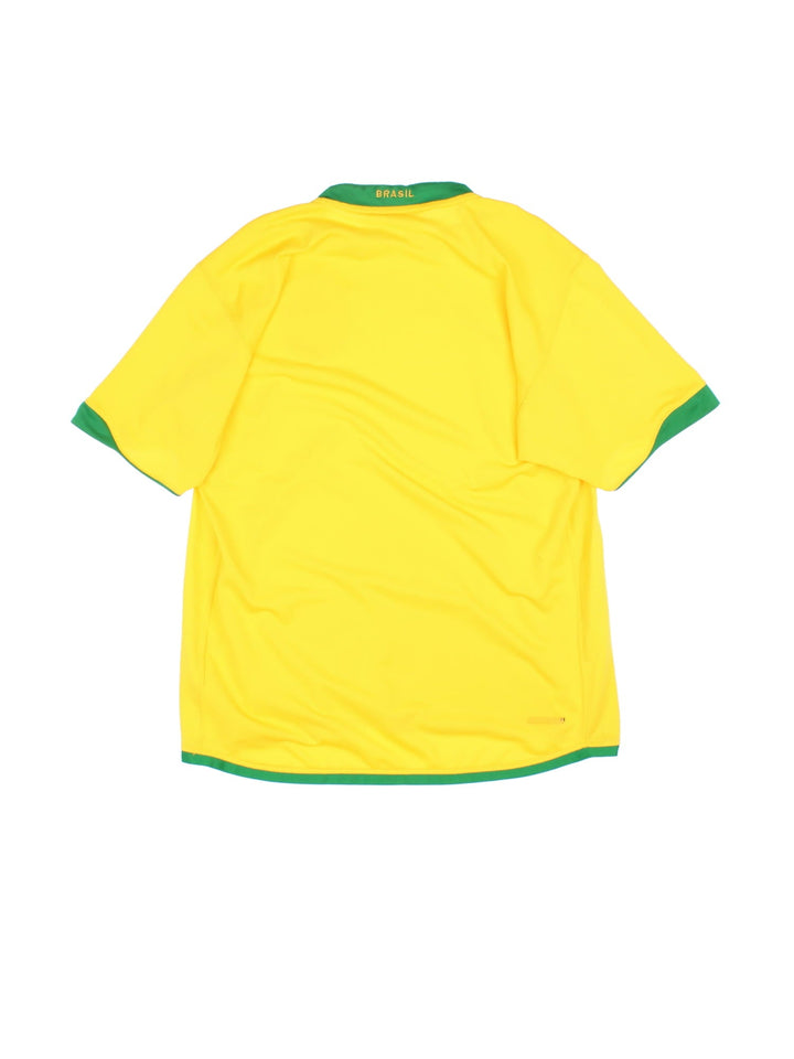 Brazil 2006/07 Nike Football Shirt in the yellow home kit colourway, features embroidered logos and badge on the front.