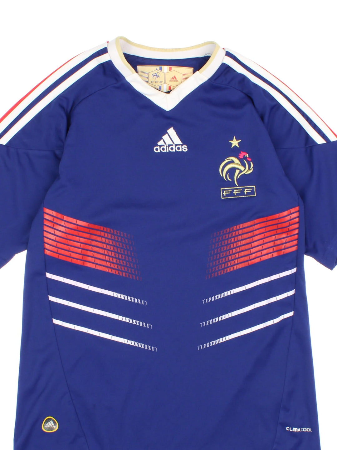 France 2009/10 Adidas World Cup Football Shirt in the blue home kit colourway, features embroidered logos and badge on the front, and world cup badge on the right sleeve.