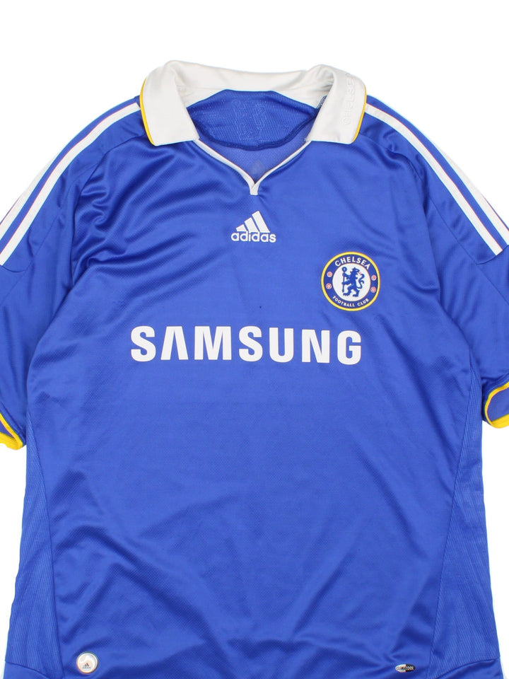 Chelsea 2008/09 Adidas Football Shirt in the blue home kit colourway, features embroidered logos and badge on the front.