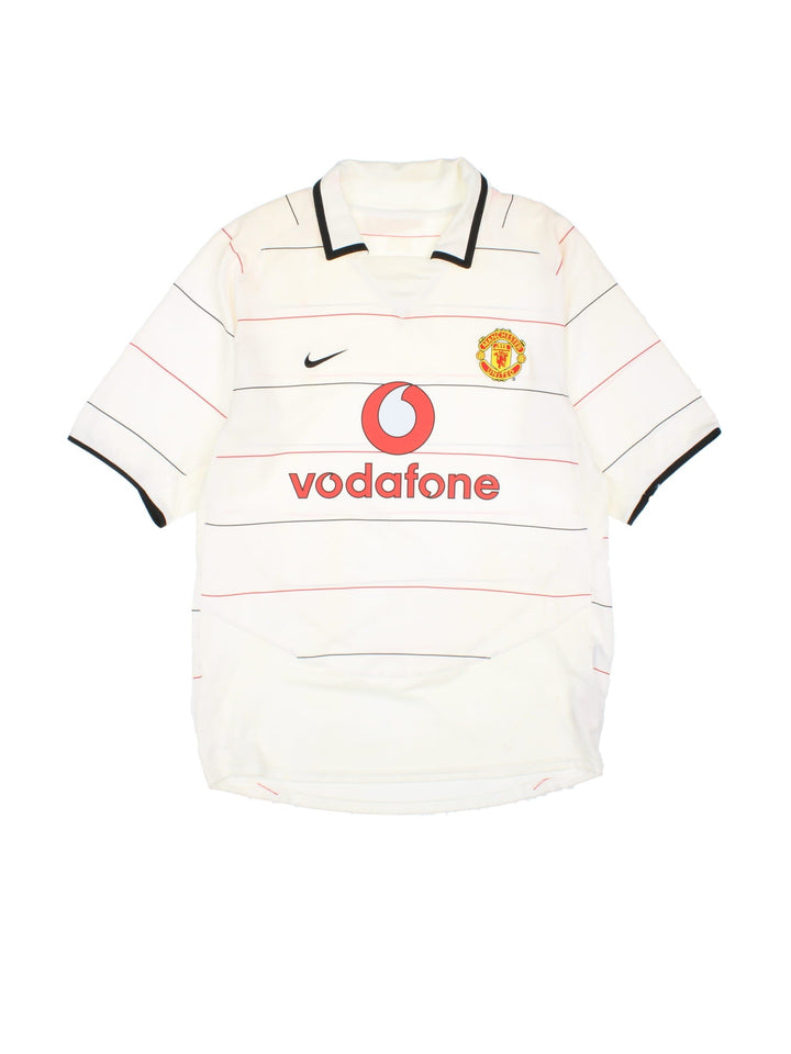 Manchester United 2003/05 Nike Football Shirt in the white striped third kit colourway, features embroidered logos and badge on the front.