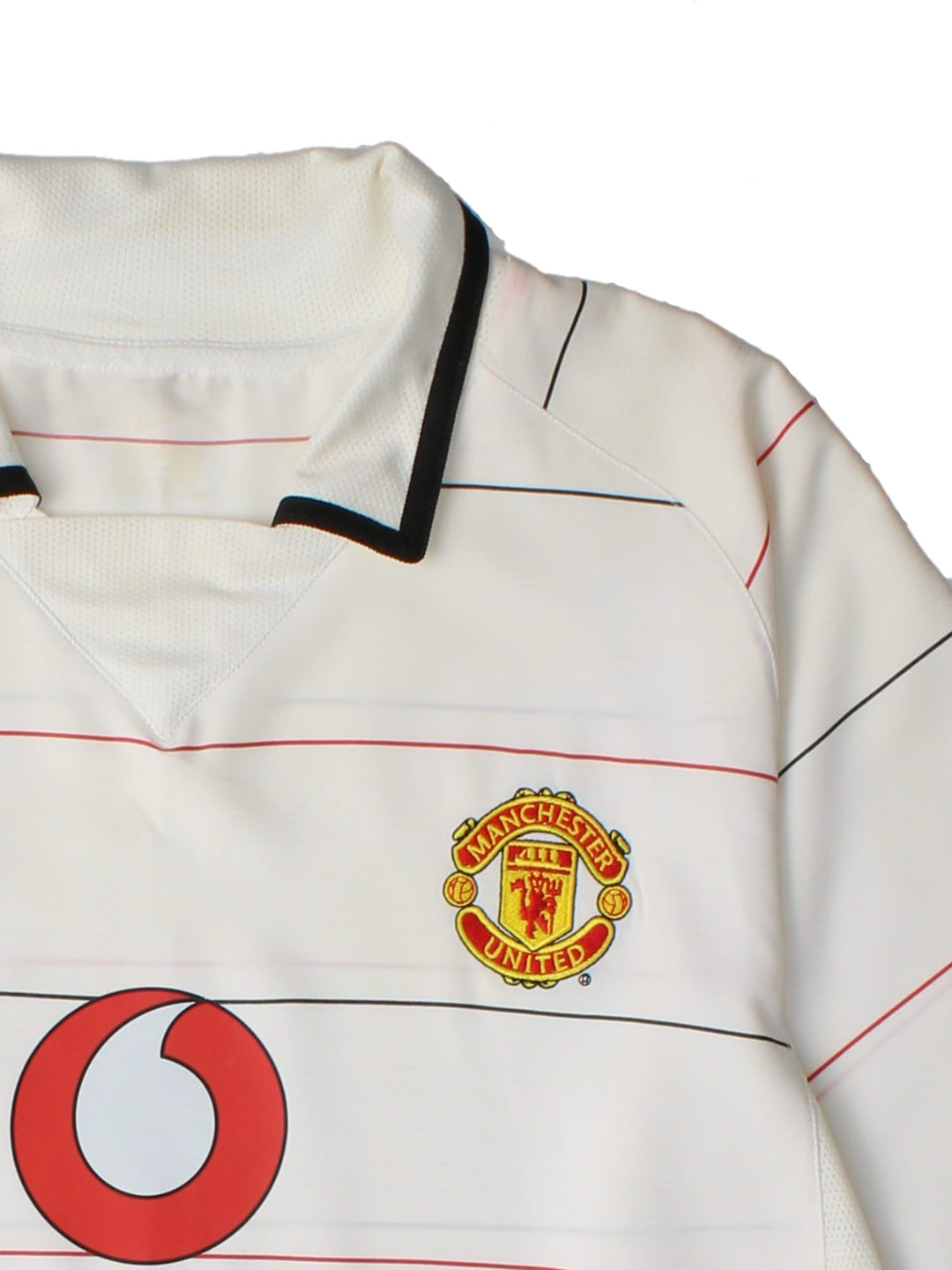 Manchester United 2003/05 Nike Football Shirt in the white striped third kit colourway, features embroidered logos and badge on the front.