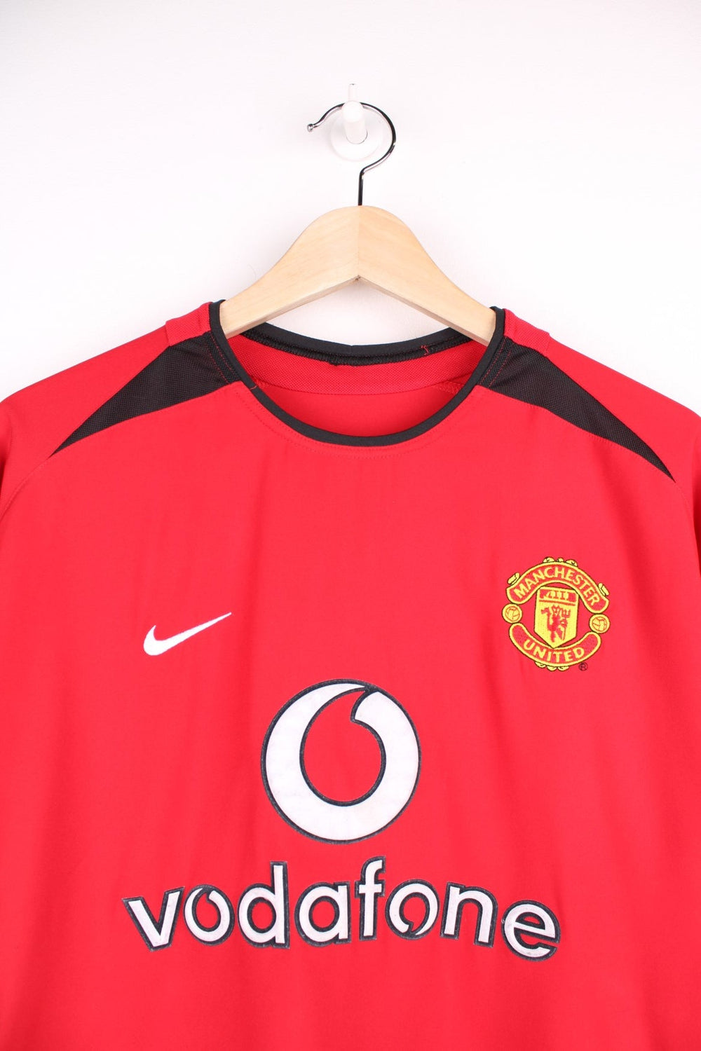 Manchester United 2002/04  Football Shirt in the  home colourway, features embroidered logo and badge on the front, and has Diego Forlan number 21 printed on the back.