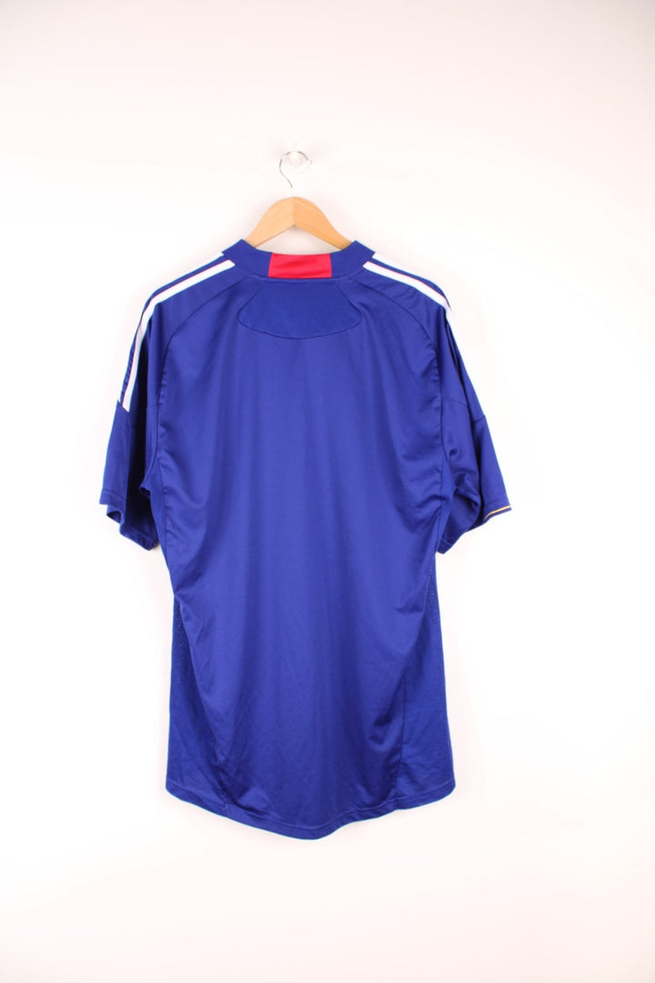 2010-11 Japan Adidas home football shirt. Features embroidered logo on the chest.