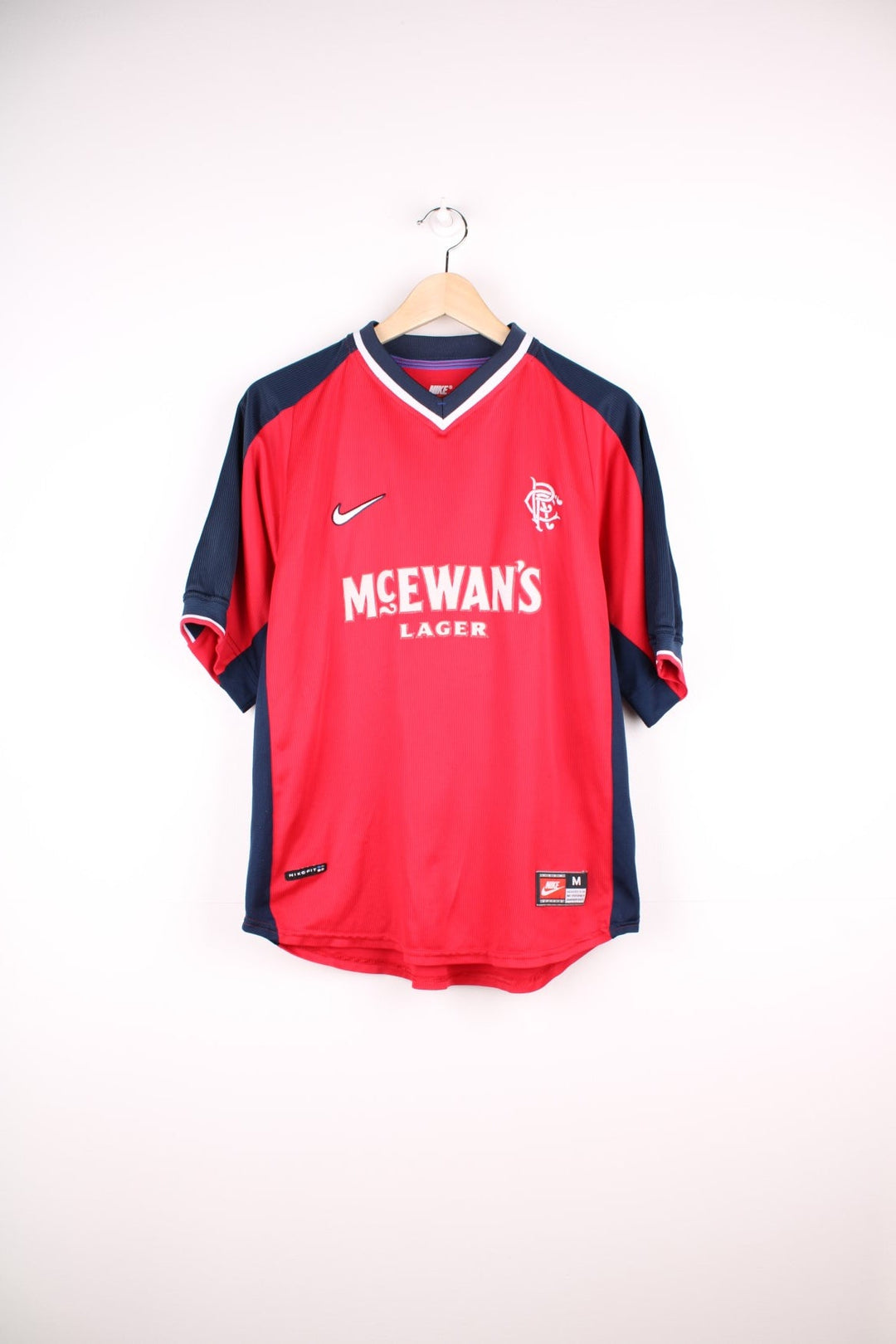 Rangers 1998/99 Nike Football Shirt in the red away colourway, features embroidered logo and badge on the front.