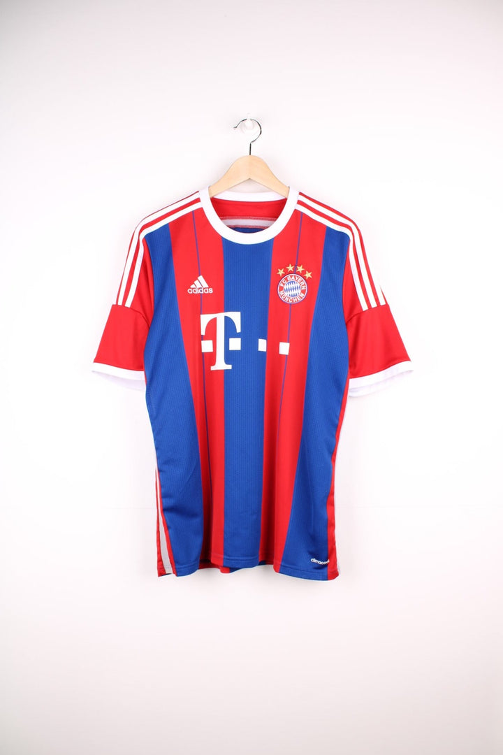 Bayern Munich 2014/15 Adidas Football Shirt in the red and blue home colourway, features embroidered logo and badge on the front.