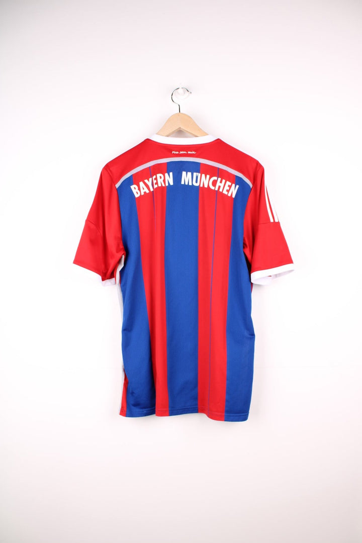 Bayern Munich 2014/15  Football Shirt in the  and blue home colourway, features embroidered logo and badge on the front.